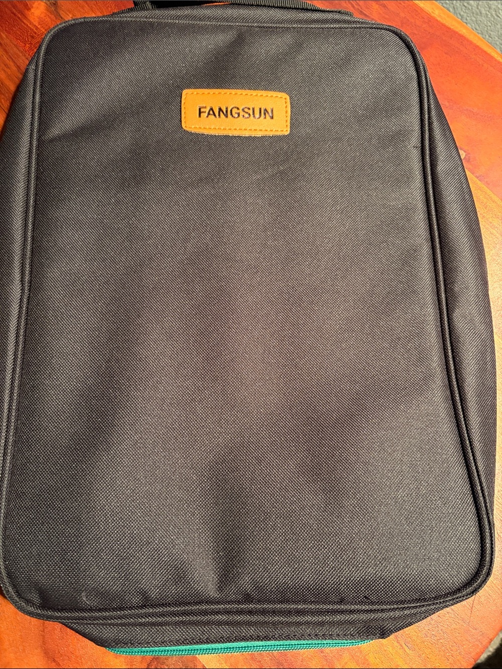 FANG Black Travel Bag with Tan Logo Patch